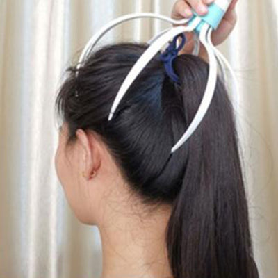 Appareil de massage crânien avec vibration du cuir chevelu